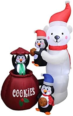 Dva ukrasa za božićne zabave, uključuje 7 stopa dugačak na napuhavanje Djeda Mraza, pingvin na vlaku, a 6 stopa visok animirani Polarni